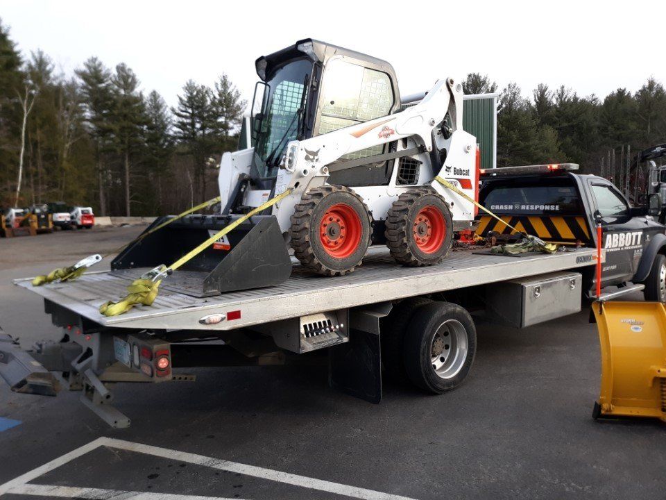 Mini Excavator Bobcat — Hudson, NH — Abbott Towing Services