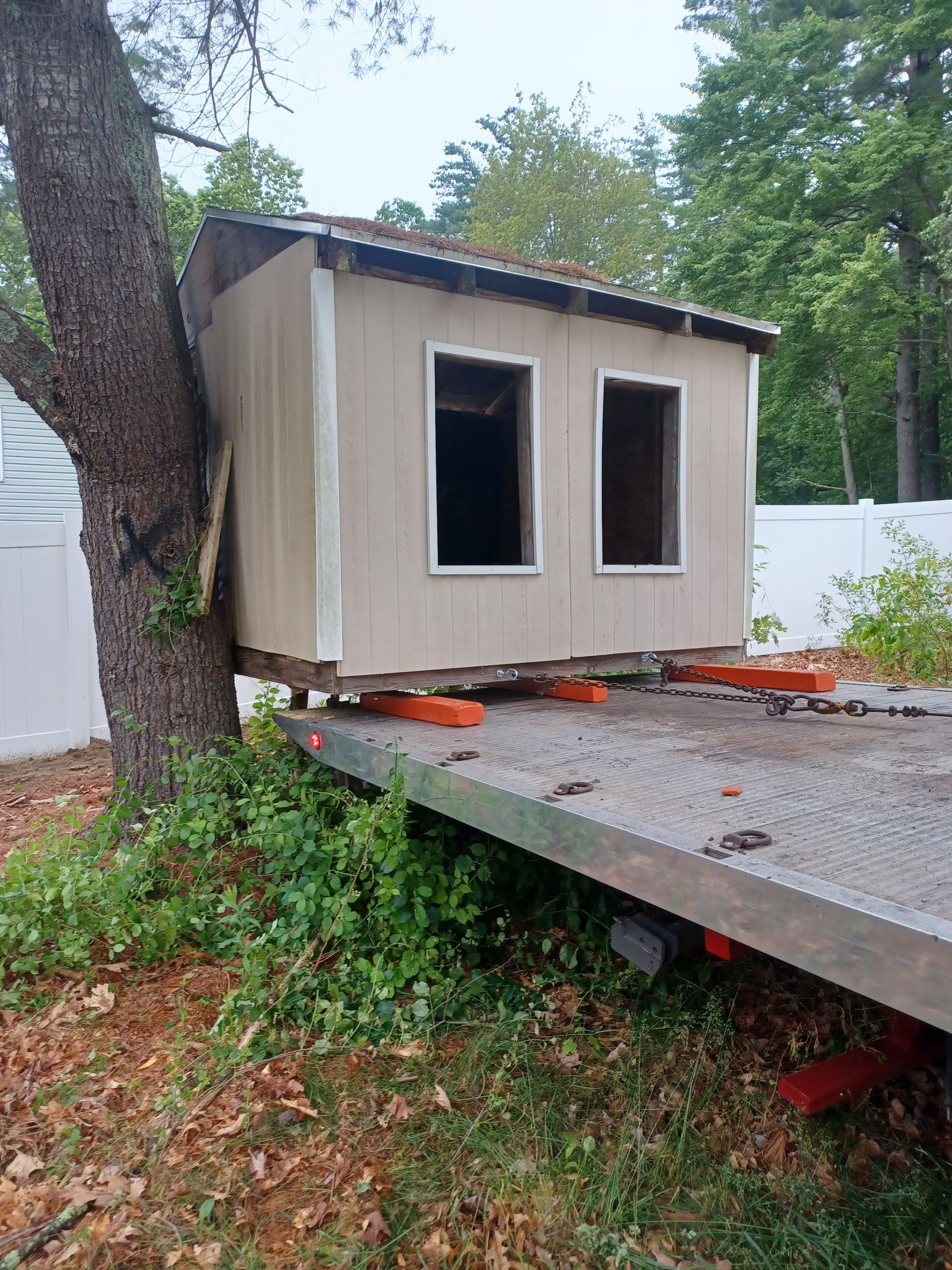 A Small House Placed Beside a Tree — Hudson, NH — Abbott Towing Service
