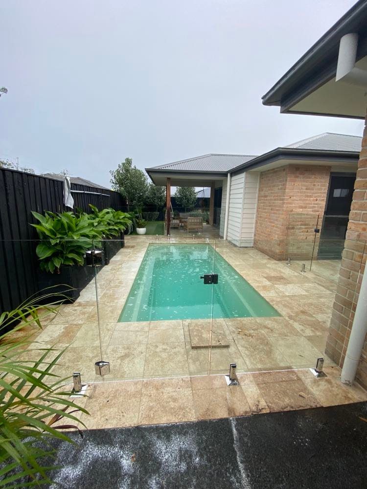 Portrait Image Of Frameless Glass Fencing — Mid Coast Glass Fencing In Old Bar, NSW