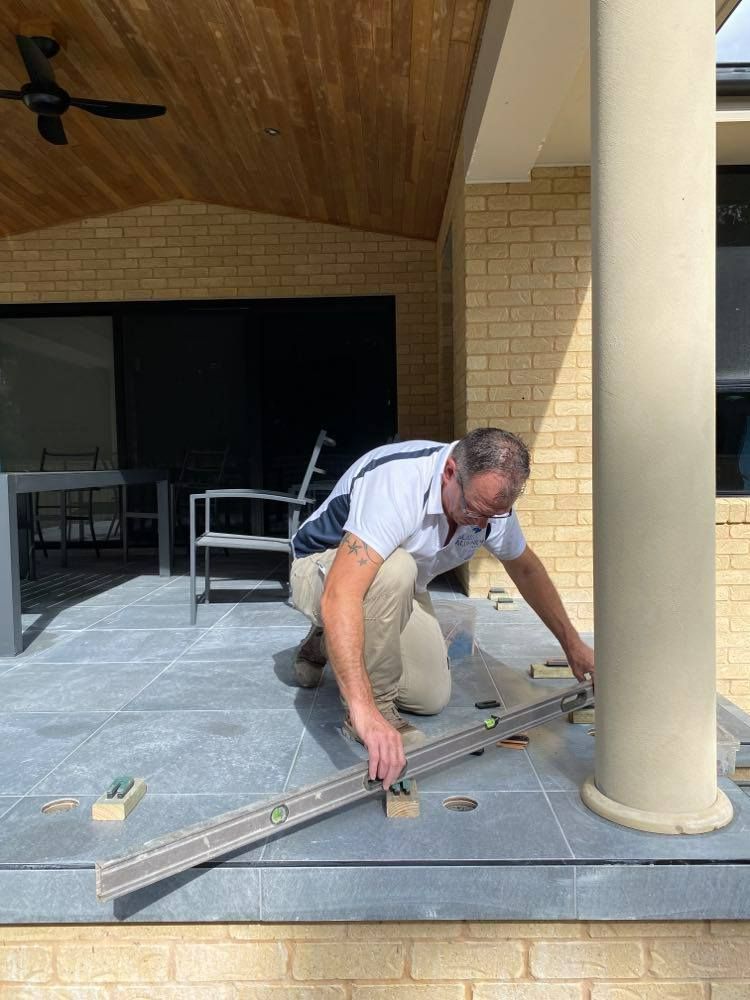 Man Installing Glass Fencing — Mid Coast Glass Fencing In Old Bar, NSW