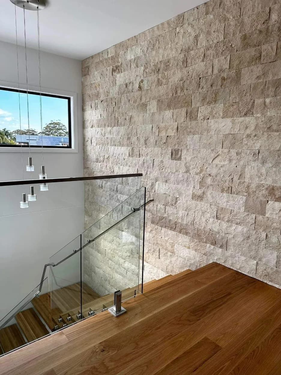 A Staircase With A Glass Railing And A Brick WALL — Mid Coast Glass Fencing In Port Macquarie, NSW