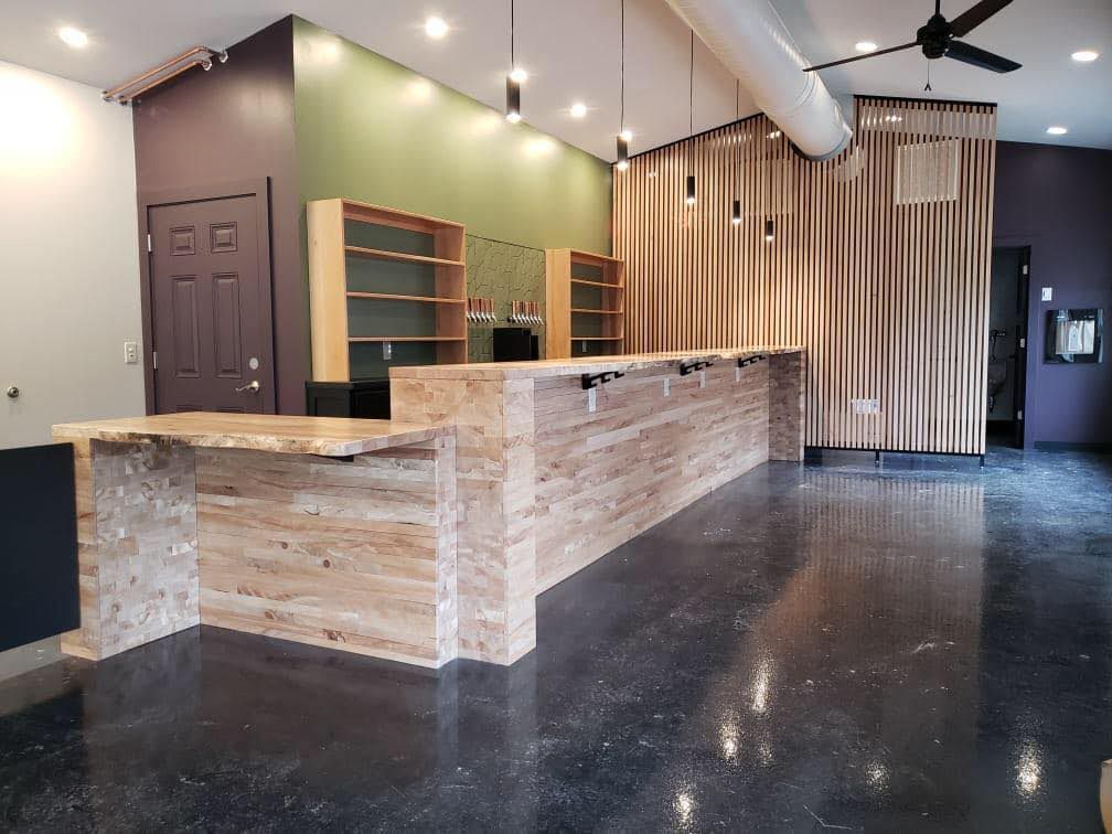 Long Wooden Counter in a Room With a Ceiling Fan — Scottsville, NY — Eljon Enterprises LLC