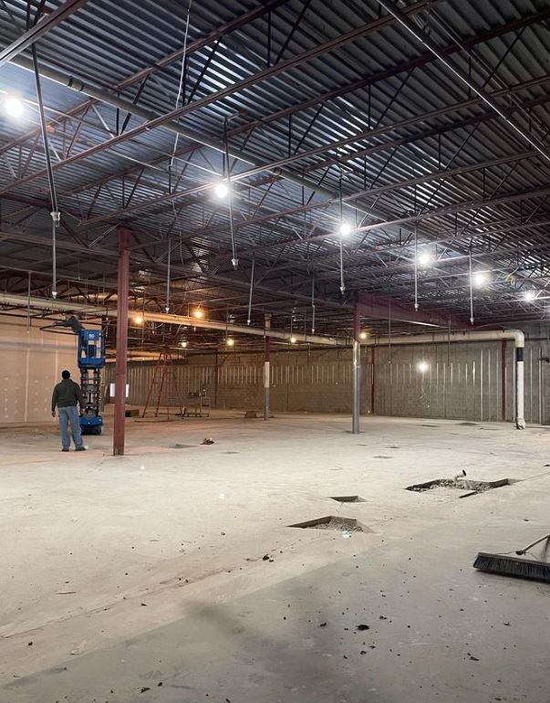 Man is Standing in an Empty Warehouse — Scottsville, NY — Eljon Enterprises LLC