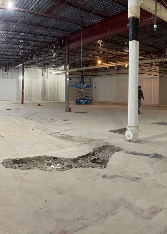 Empty Warehouse With a Man Standing — Scottsville, NY — Eljon Enterprises LLC