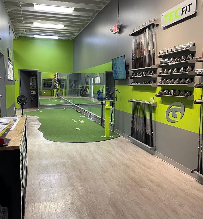 Hallway in a Gym With a Green Carpet — Scottsville, NY — Eljon Enterprises LLC