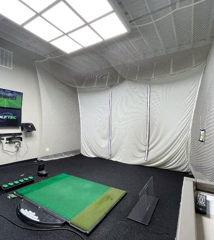 Room With a Green Mat and a TV — Scottsville, NY — Eljon Enterprises LLC