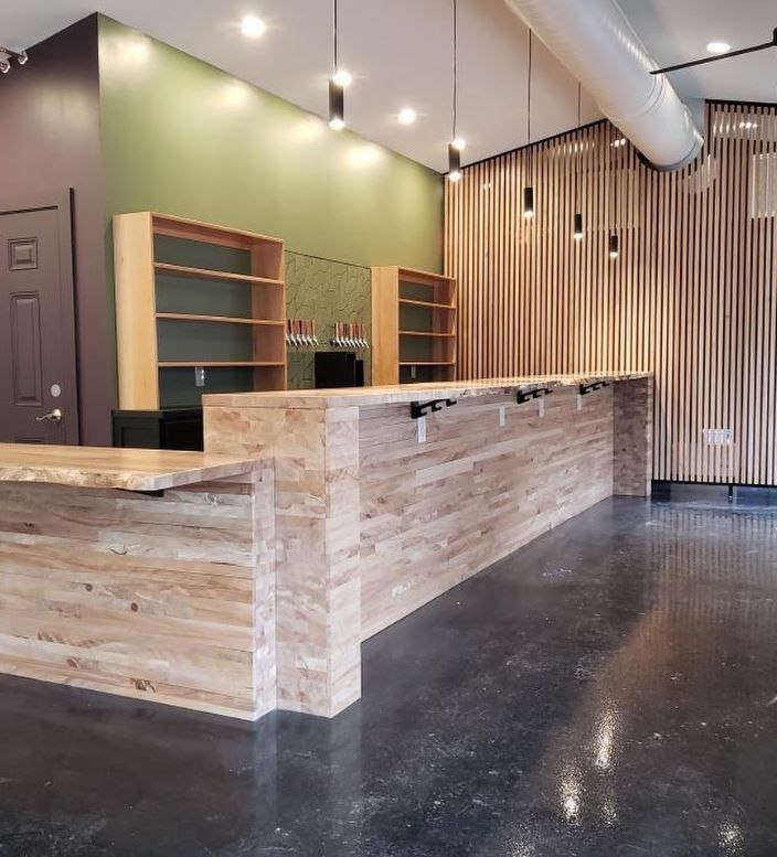 Lobby With a Long Wooden Counter and Shelves — Scottsville, NY — Eljon Enterprises LLC