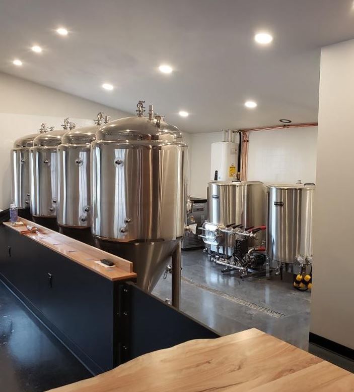 Room Filled With Lots of Stainless Steel Tanks — Scottsville, NY — Eljon Enterprises LLC