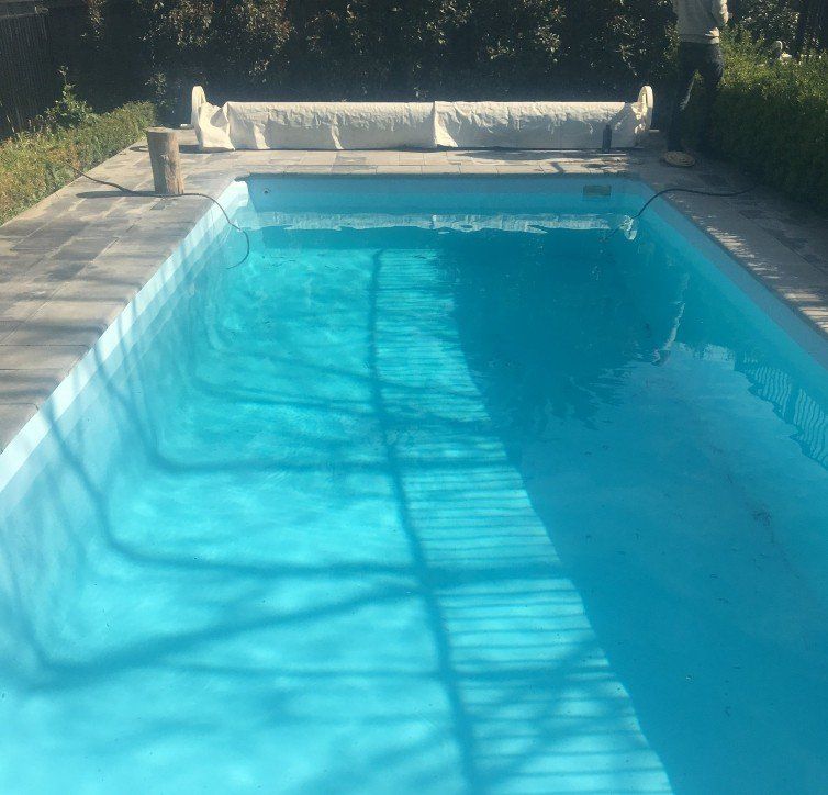 Learn more about our pool resurfacing service A large resurfaced swimming pool