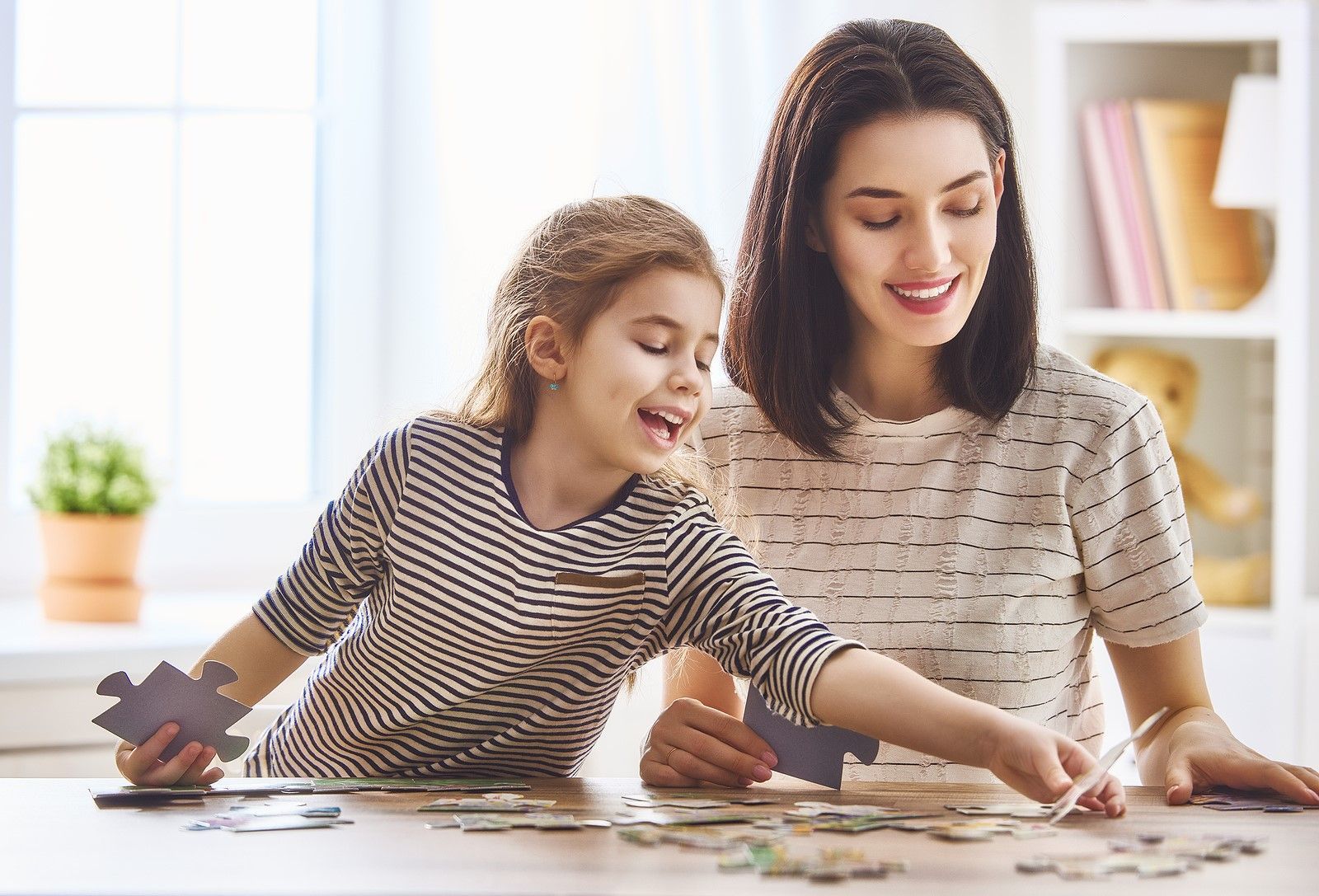 Mother and Child playing with a puzzle