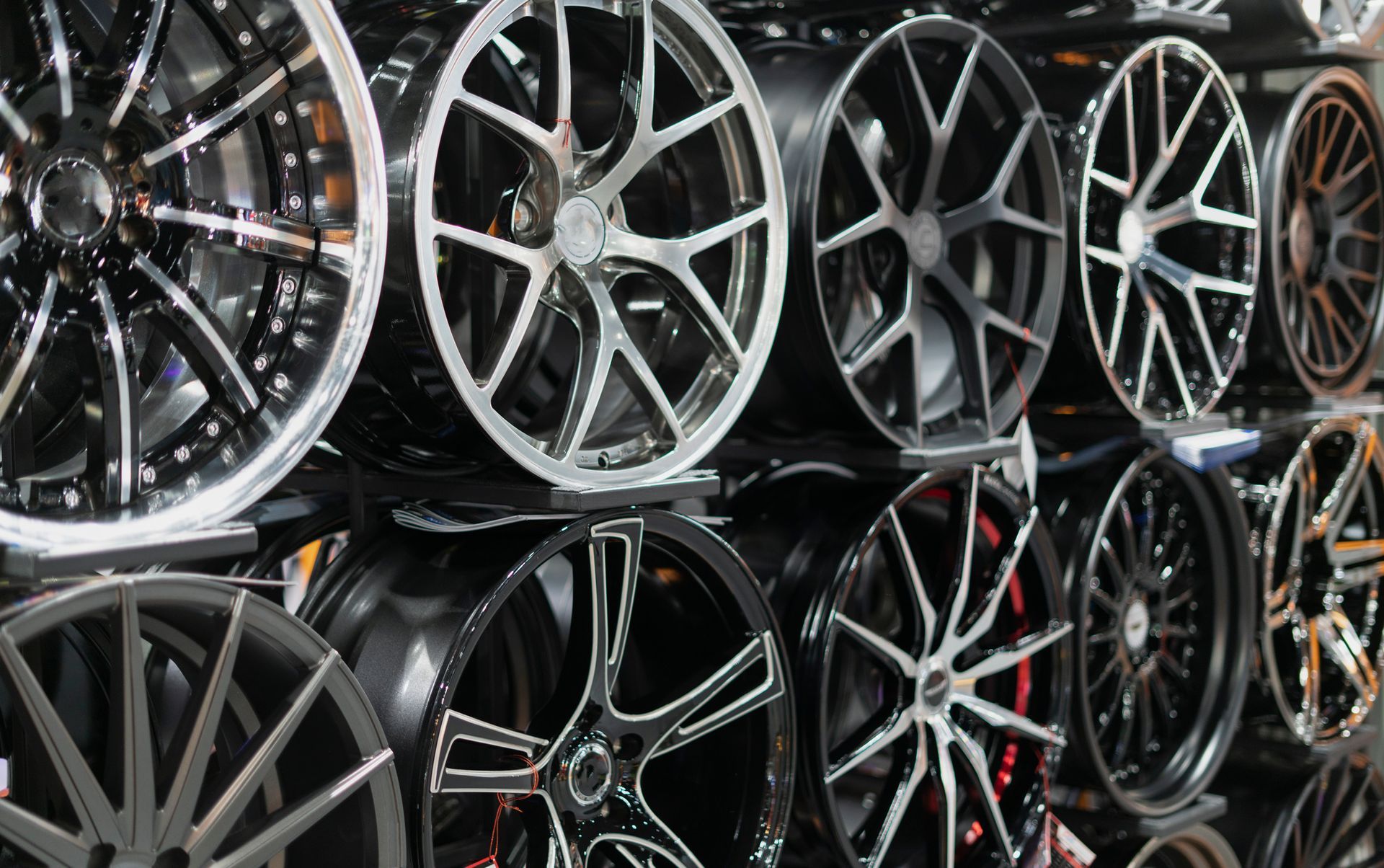 Fancy rims on a big rack in a specialist store. 