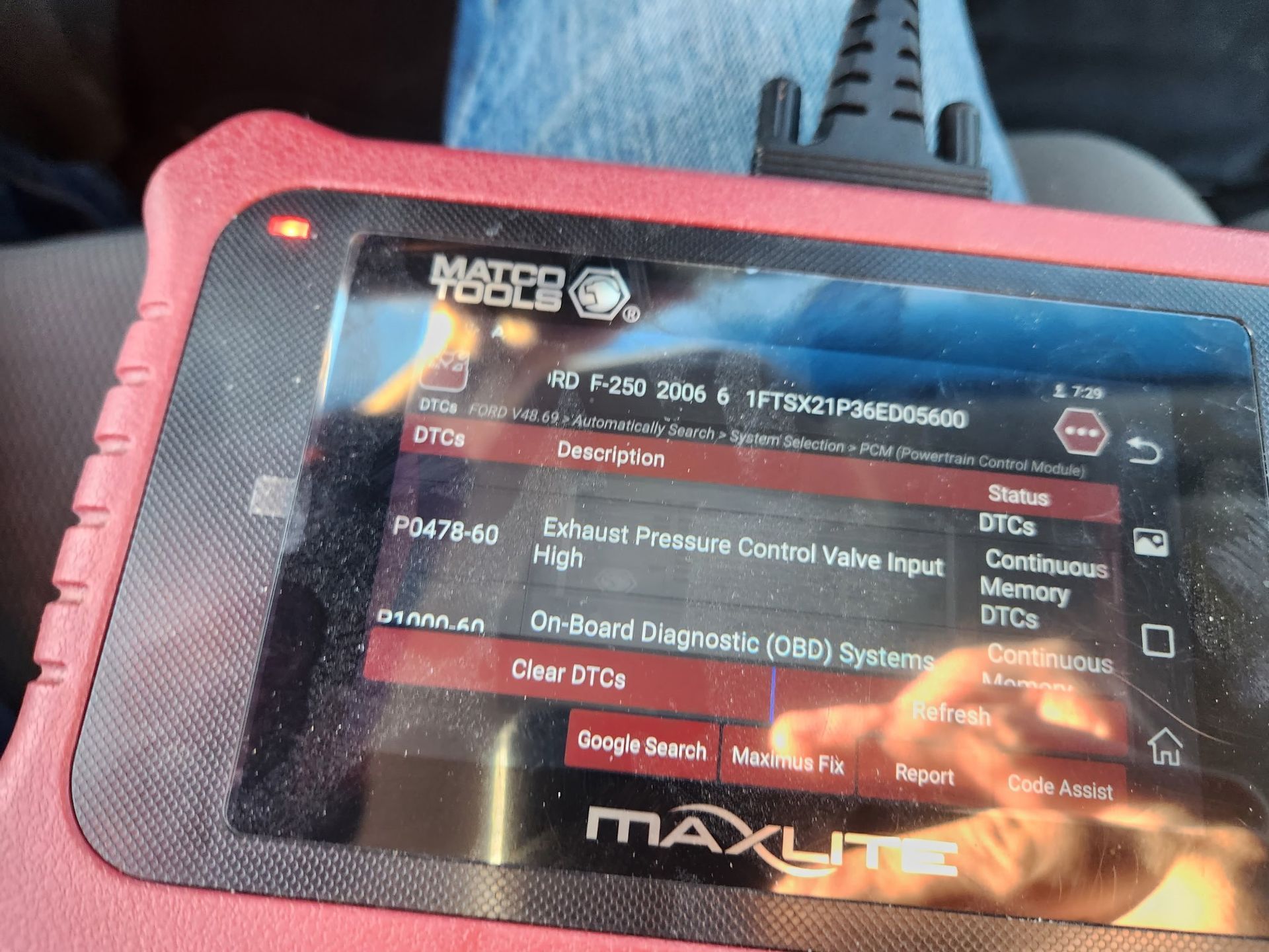 A red Matco Tools MAXLITE diagnostic scanner displaying an error code P3476-HC for a Ford F-350 truck.
