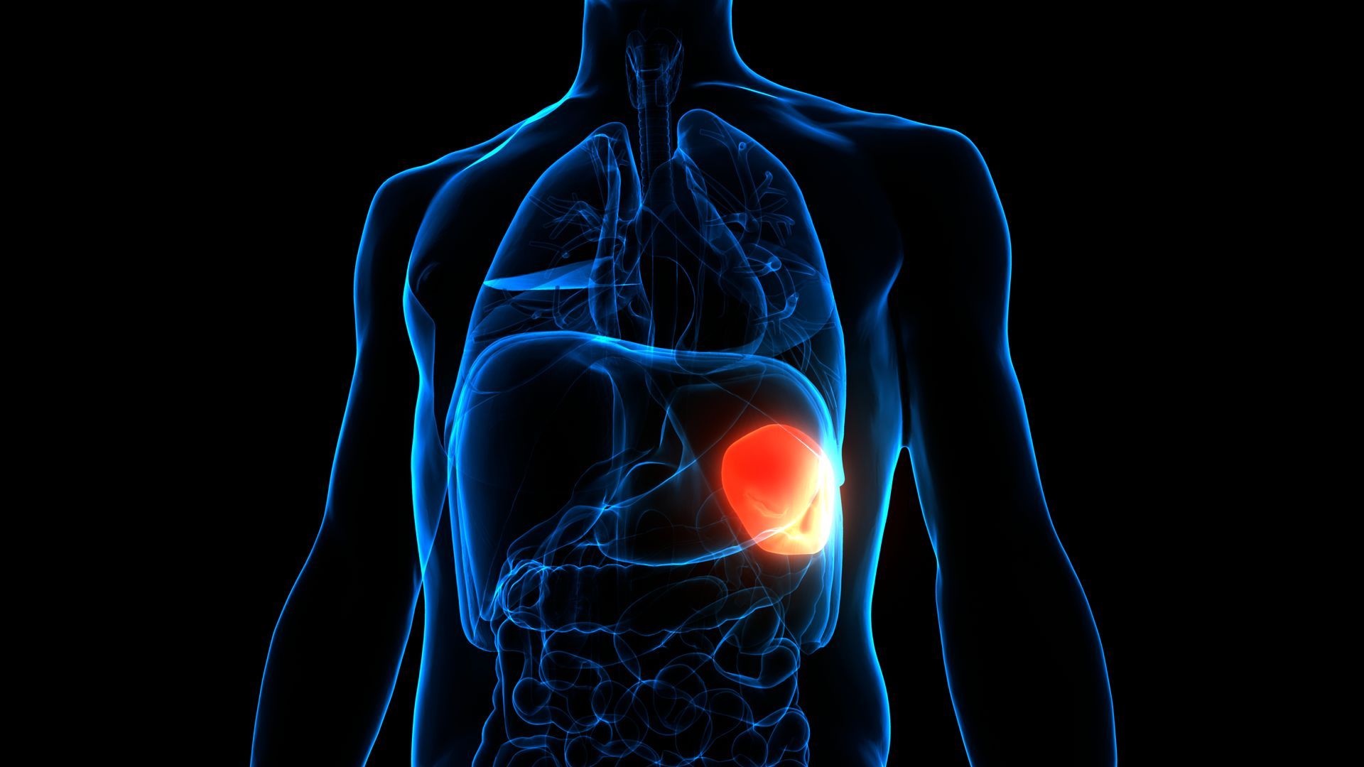 Two surgeons are looking up at a light in an operating room.