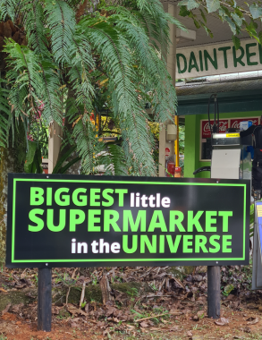 A Branded Tabletop Sign Featuring a Beach Scene — On The Spot Signs Port Douglas In Port Douglas, QLD