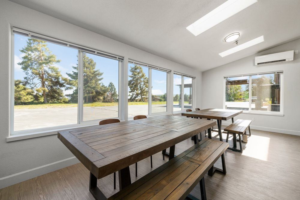 Shasta Place common area with benches and plenty of natural lighting