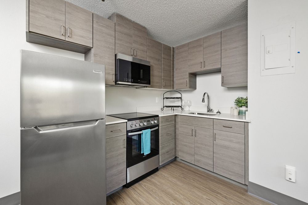 Photo of a kitchen with brownish-gray cabinetry