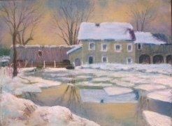 Winter sunset over a light colored house