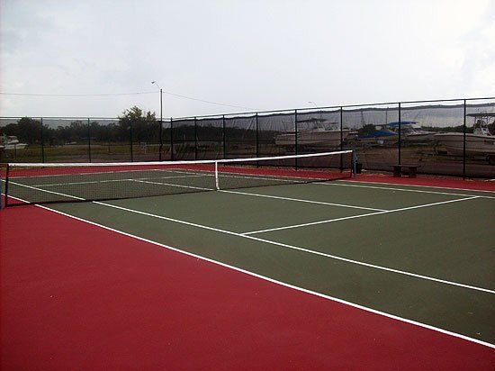 Tennis Court with Fence — Pascagoula, MS — Gulf Coast Fence Co.