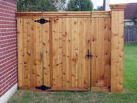 Wooden Fence with Door — Pascagoula, MS — Gulf Coast Fence Co.