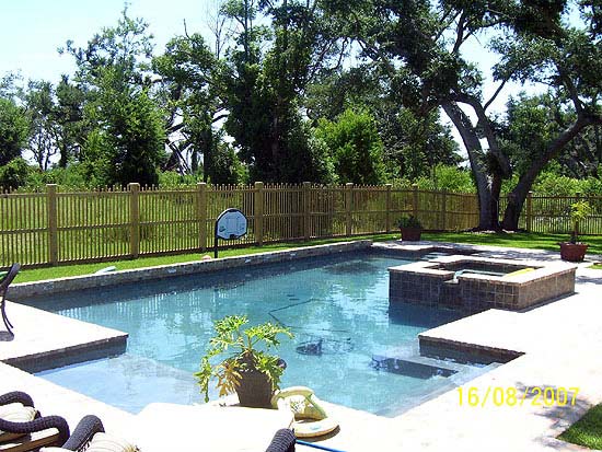 Swimming Pool with Fence — Pascagoula, MS — Gulf Coast Fence Co.