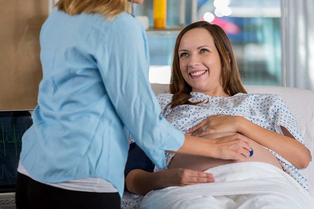 OB/Gyn Examines Pregnant Woman | Asheville, NC | Grace OB/GYN Physicians