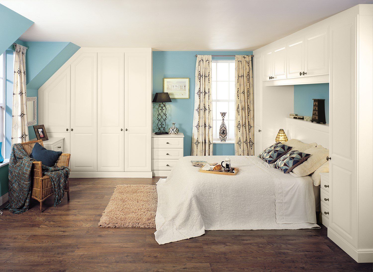 bedroom with blue curtains