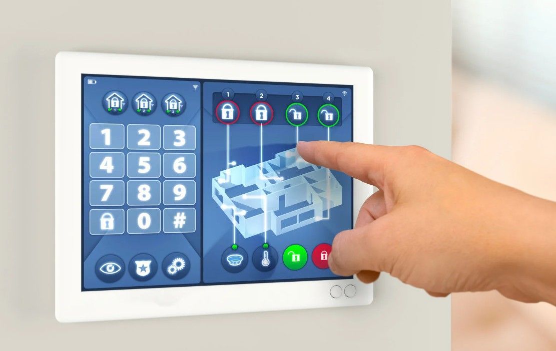 Derbyshire Electrical Specialists customer setting their burglar alarm system