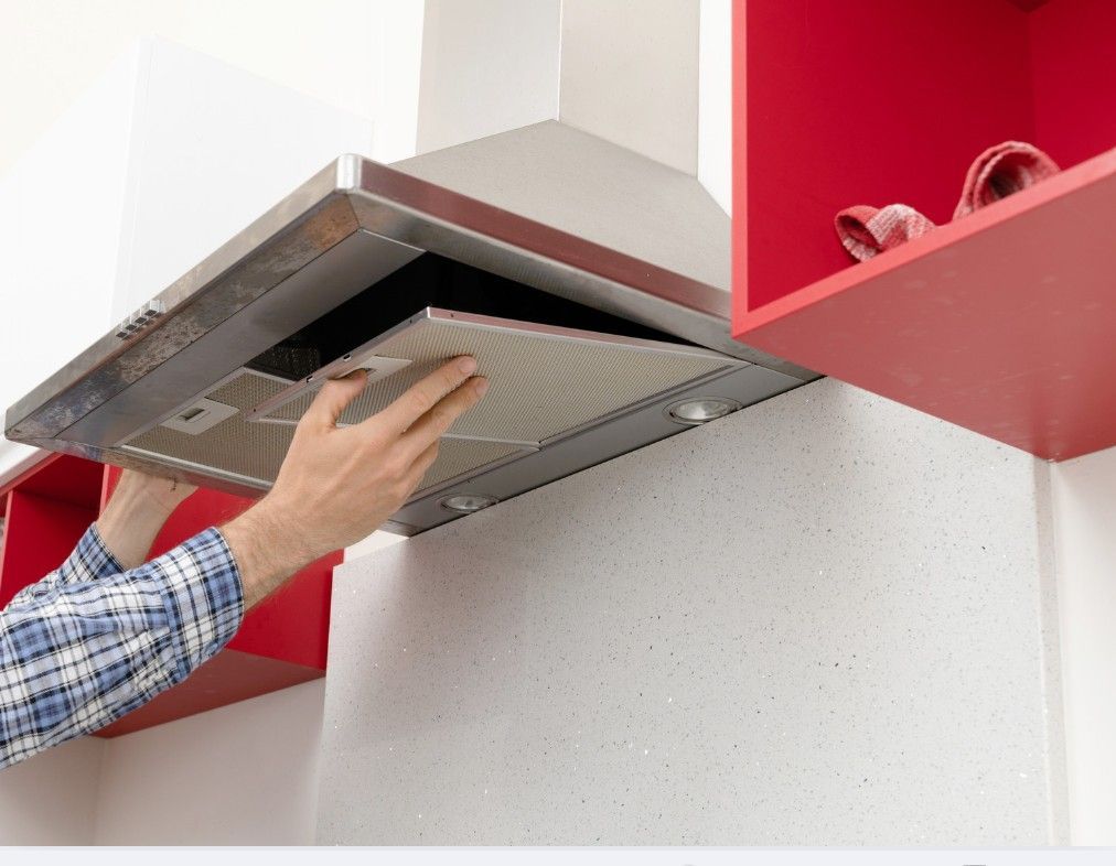 Derbyshire Electrical Specialists replacing a kitchen extractor vent in Derby