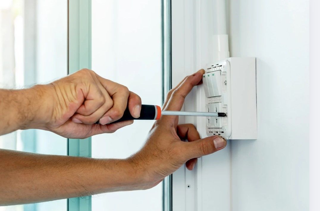 Derbyshire Electrical Specialists fitting a new switch in Allestree