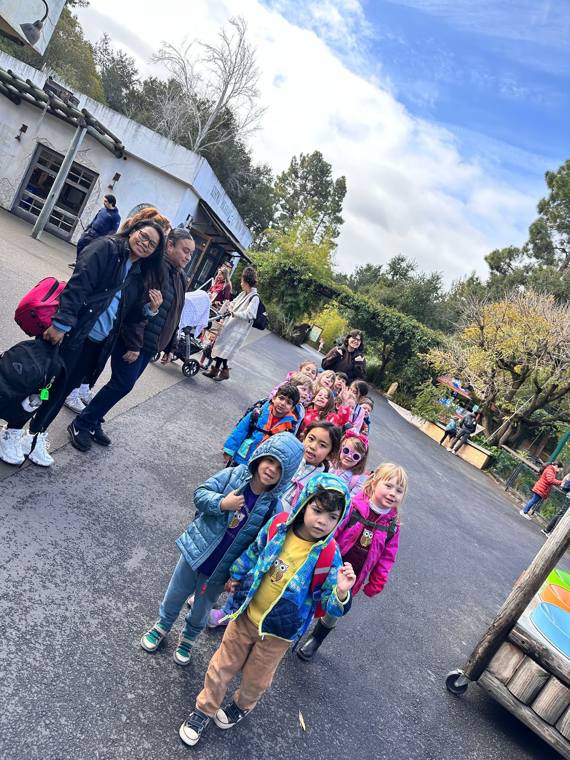 A group of Montessori child and Montessori guides arriving at the Oakland Zoo