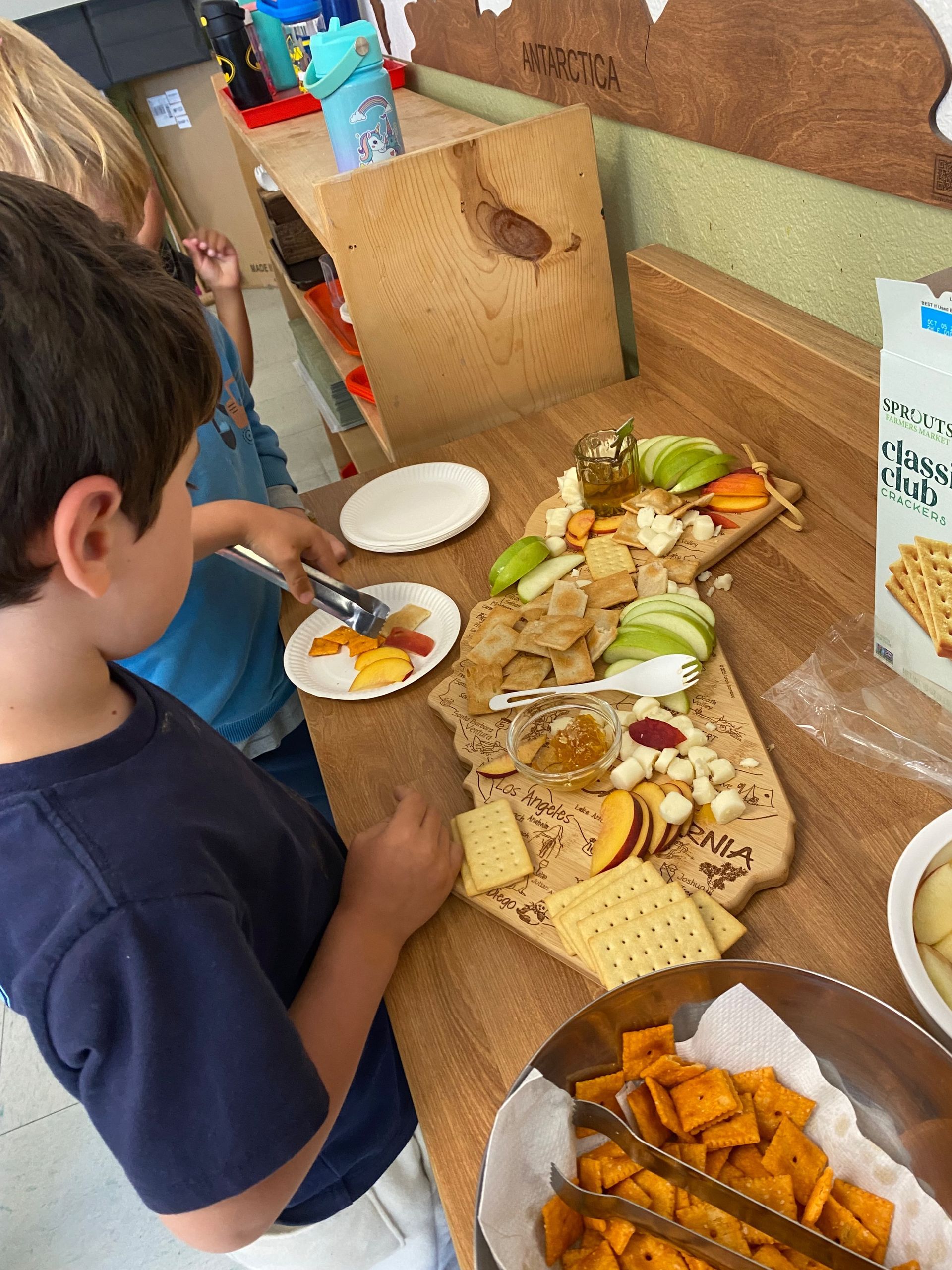 montessori child working with practical life activity