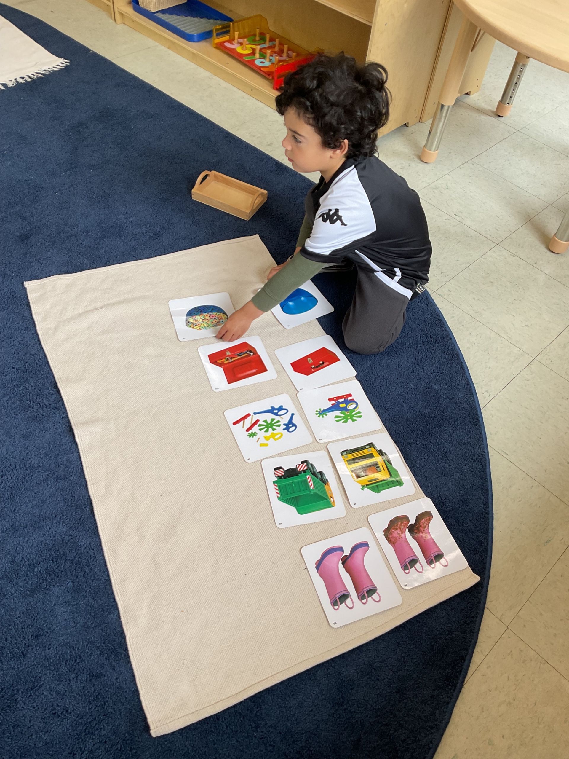 montessori child working with sensorial activity
