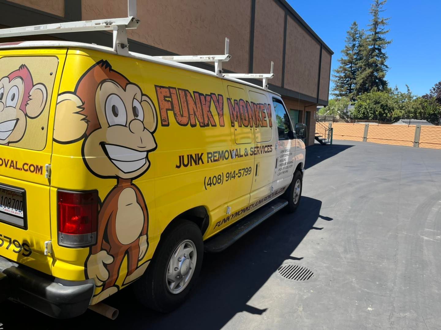 Three people with thumbs up pose for the camera. They wear 