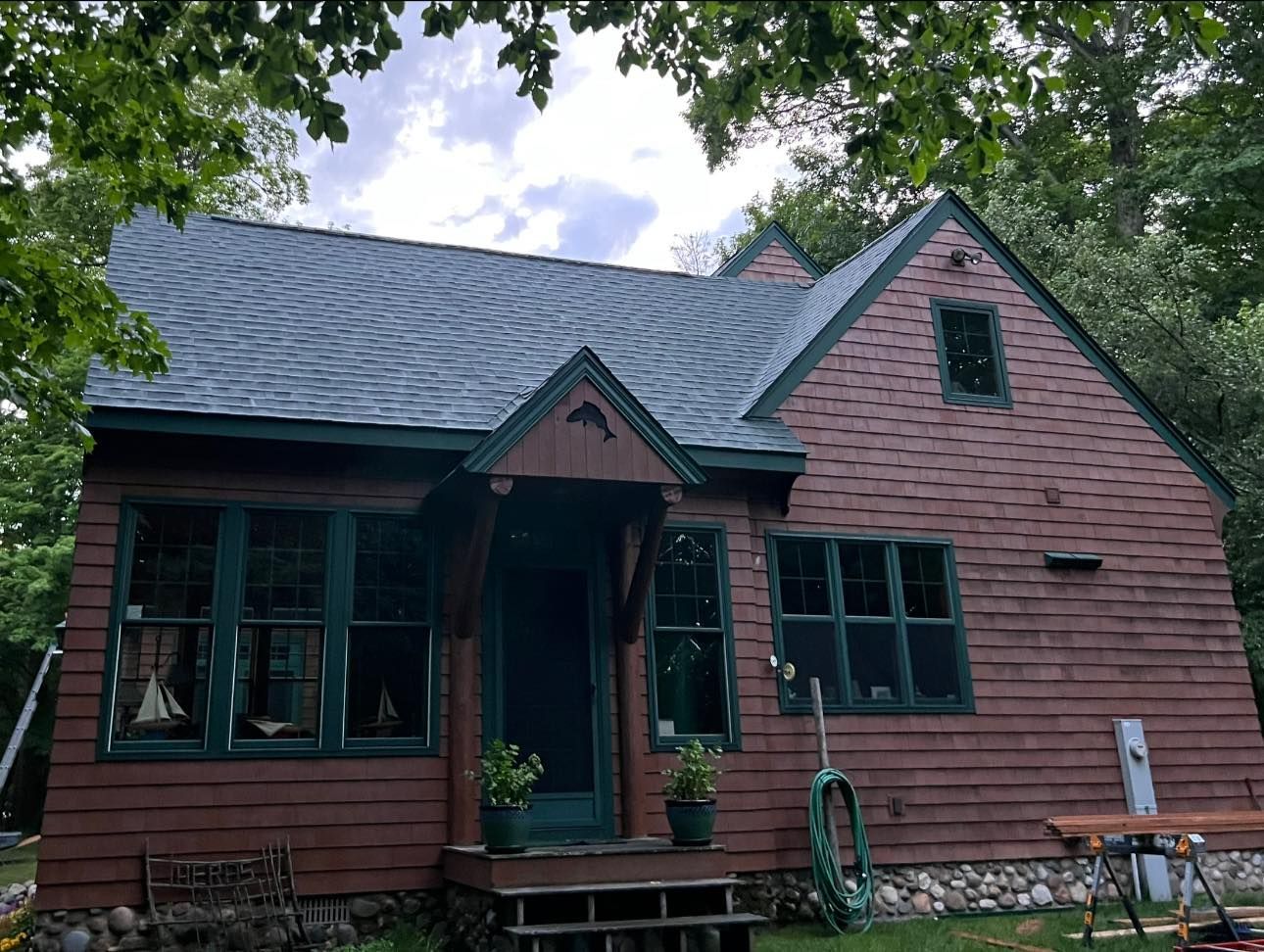 Shingle roofing installation in Curtis, Michigan, using high-quality Atlas shingles by expert Northern Michigan roofing specialists.