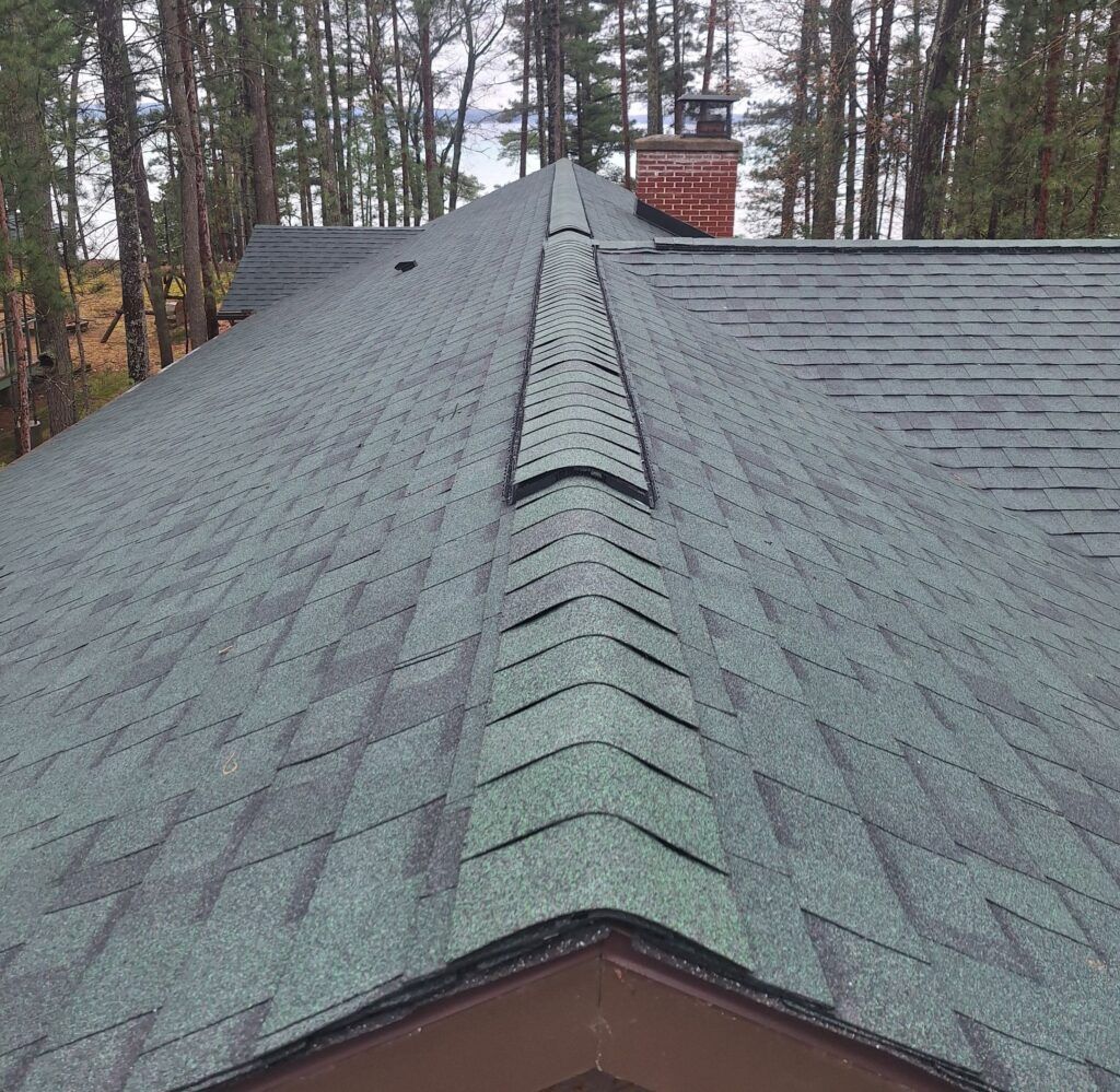 Roscommon, Michigan roofing project featuring Atlas shingles, expertly installed by Northern Michigan roofing specialists.