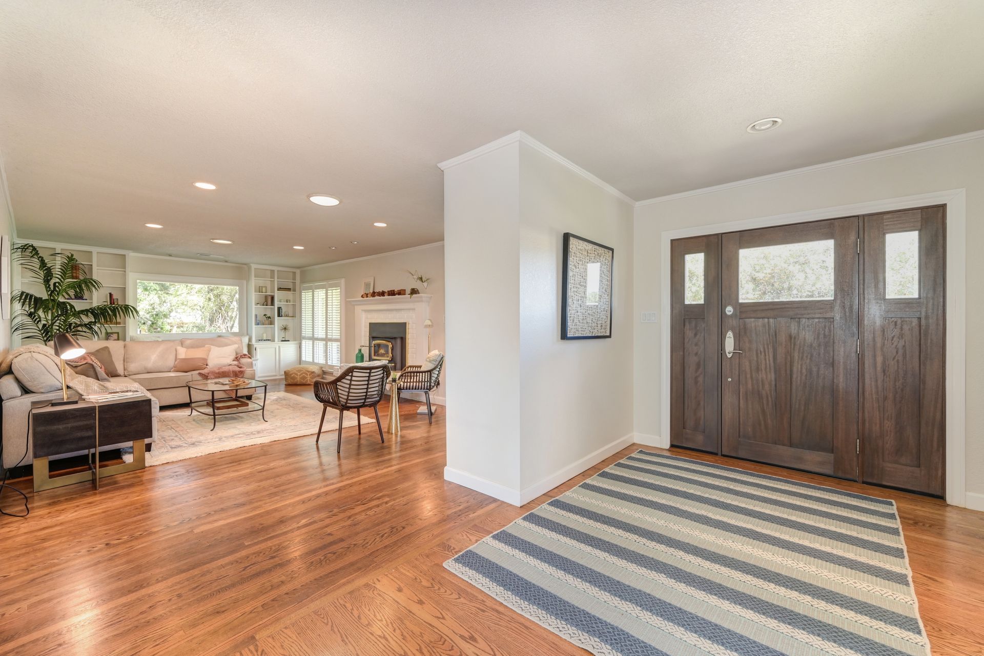 A living room with hardwood floors. Partner with Rich Cazneaux Real Estate Group to Buy a House in East Sacramento, CA