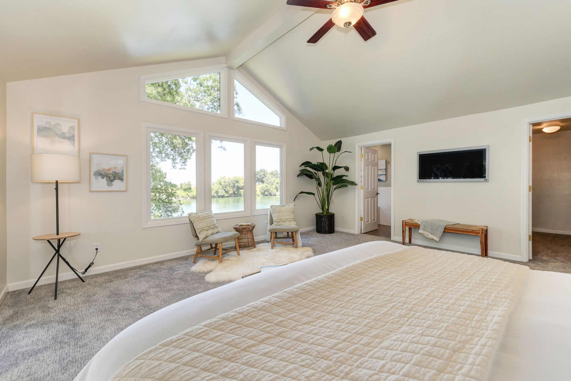 Bright & Cozy bedroom with large windows. Explore Homes for Sale in East Sacramento, CA with Rich Cazneaux Real Estate Group