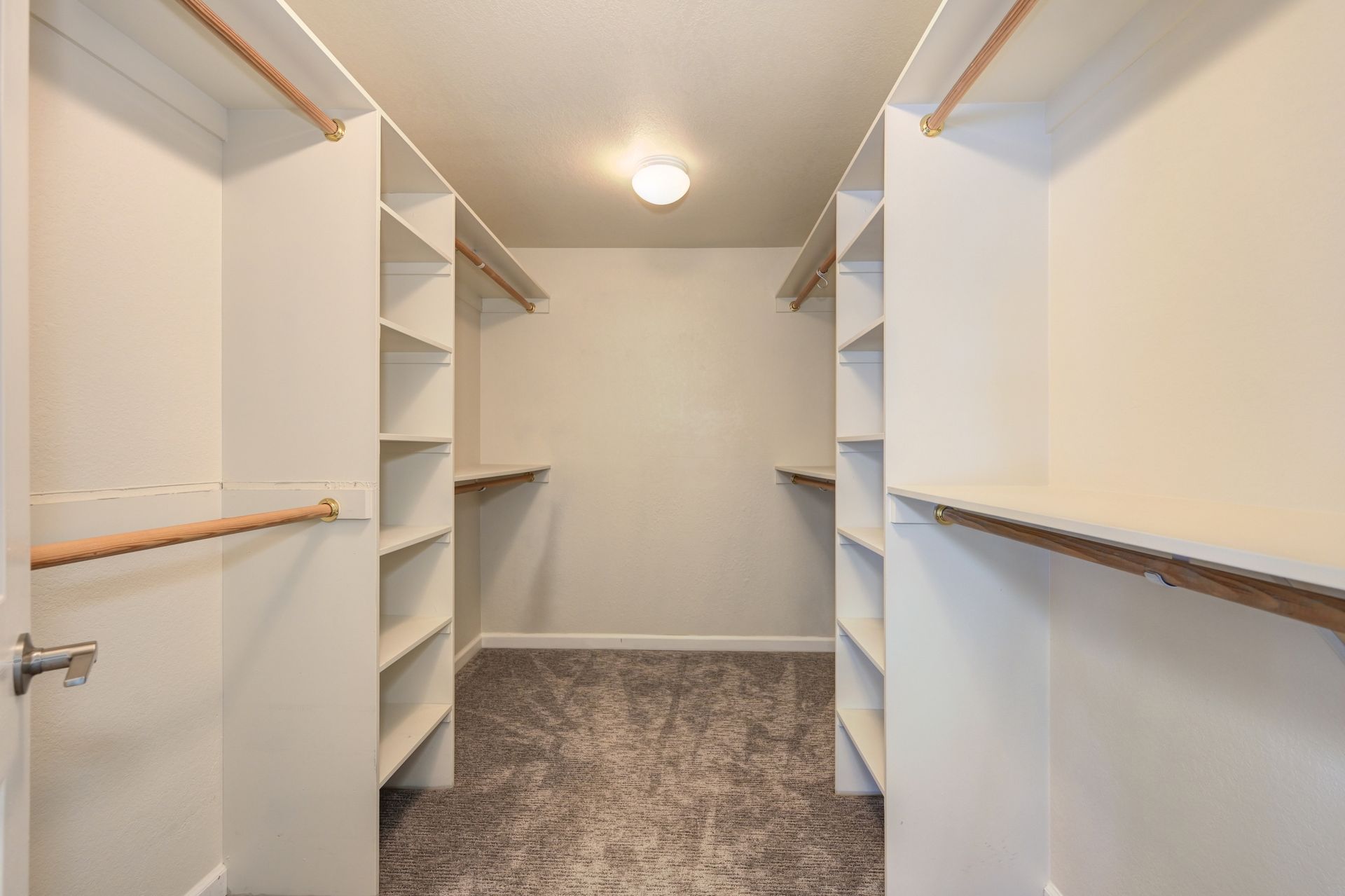 A walk in Closet with lots of shelves. Find your Dream home with the top Realtor in East Sacramento | Rich Cazneaux