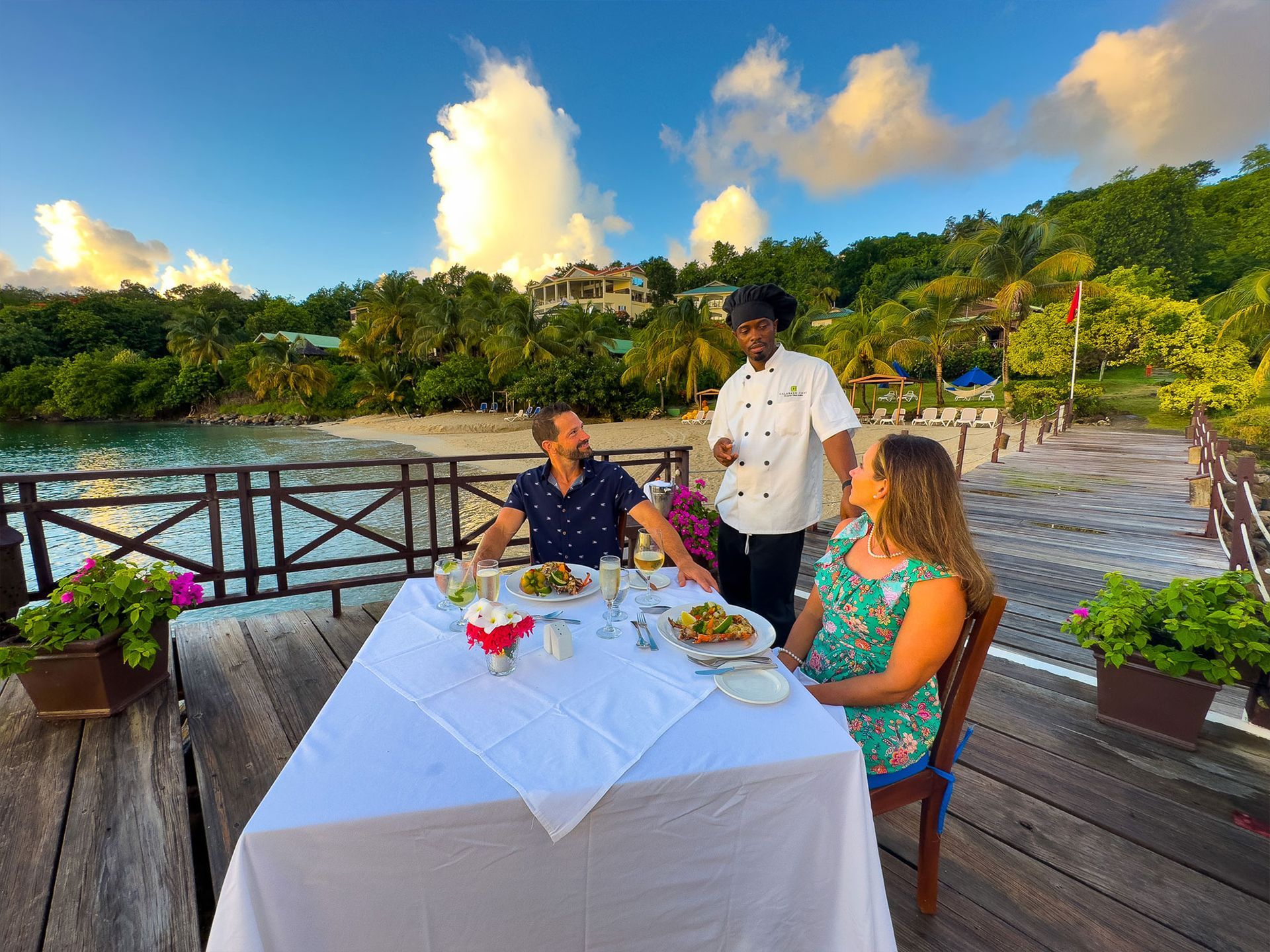 A couple having dinner at Calabash Cove's beautiful Boardwalk location