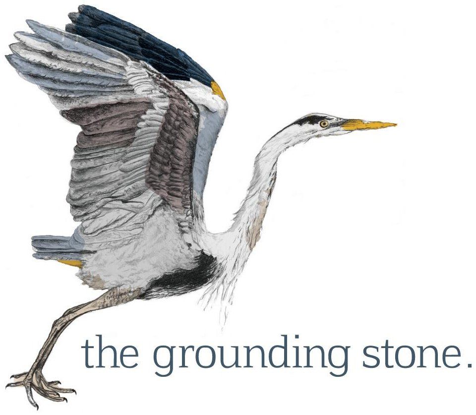 A bird is flying with the words the grounding stone below it