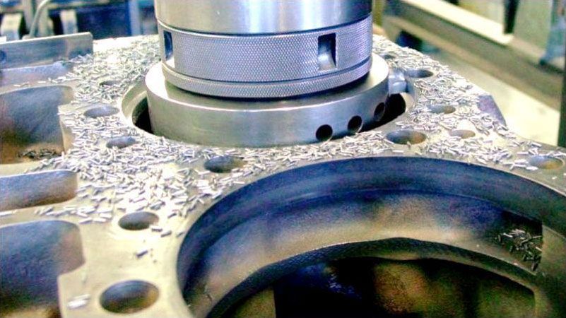 a close up of a metal object with holes in it