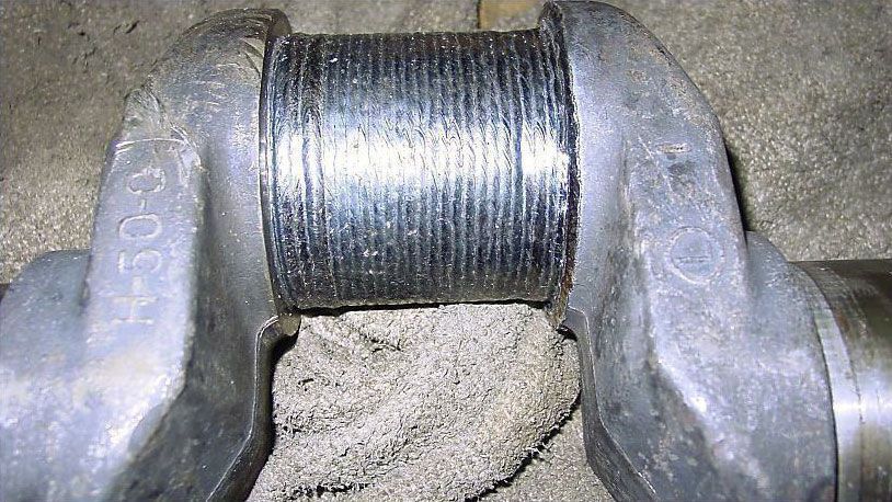 a close up of a metal crankshaft with the number 50 on it