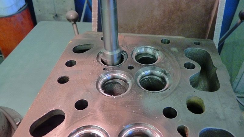 a close up of a metal object with holes in it