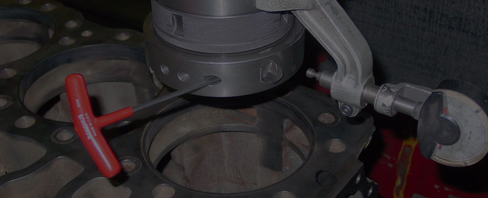A close up of a machine cutting a piece of metal.