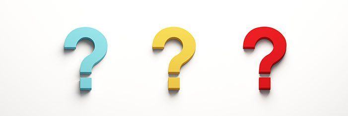Three colorful question marks on a white background.
