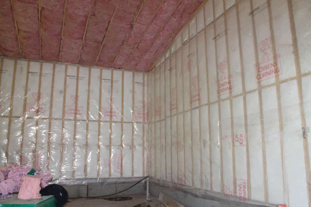A room with a lot of insulation on the walls and ceiling.