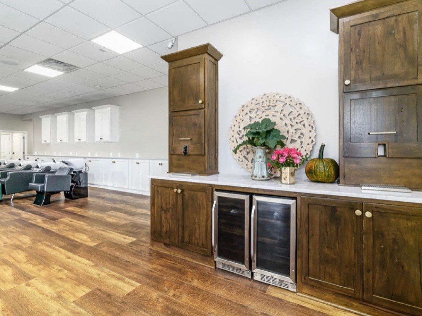 A kitchen with wooden cabinets and stainless steel appliances.