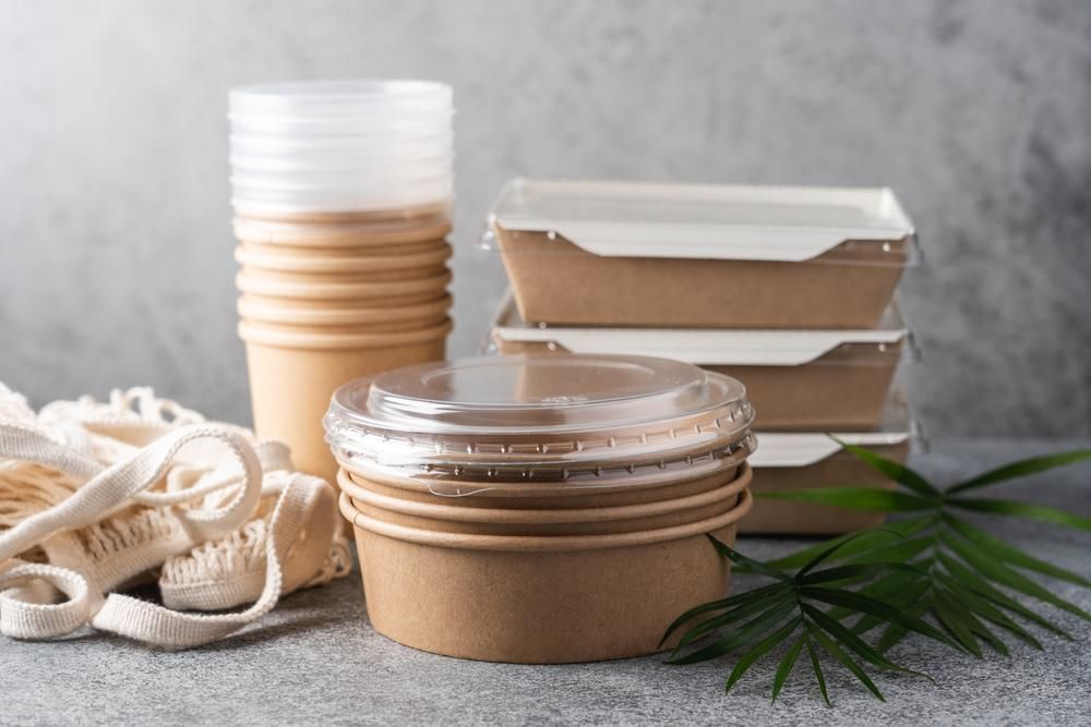 A Stack of Paper Containers — Mackay Cleaning & Packaging Supplies in Mackay, QLD