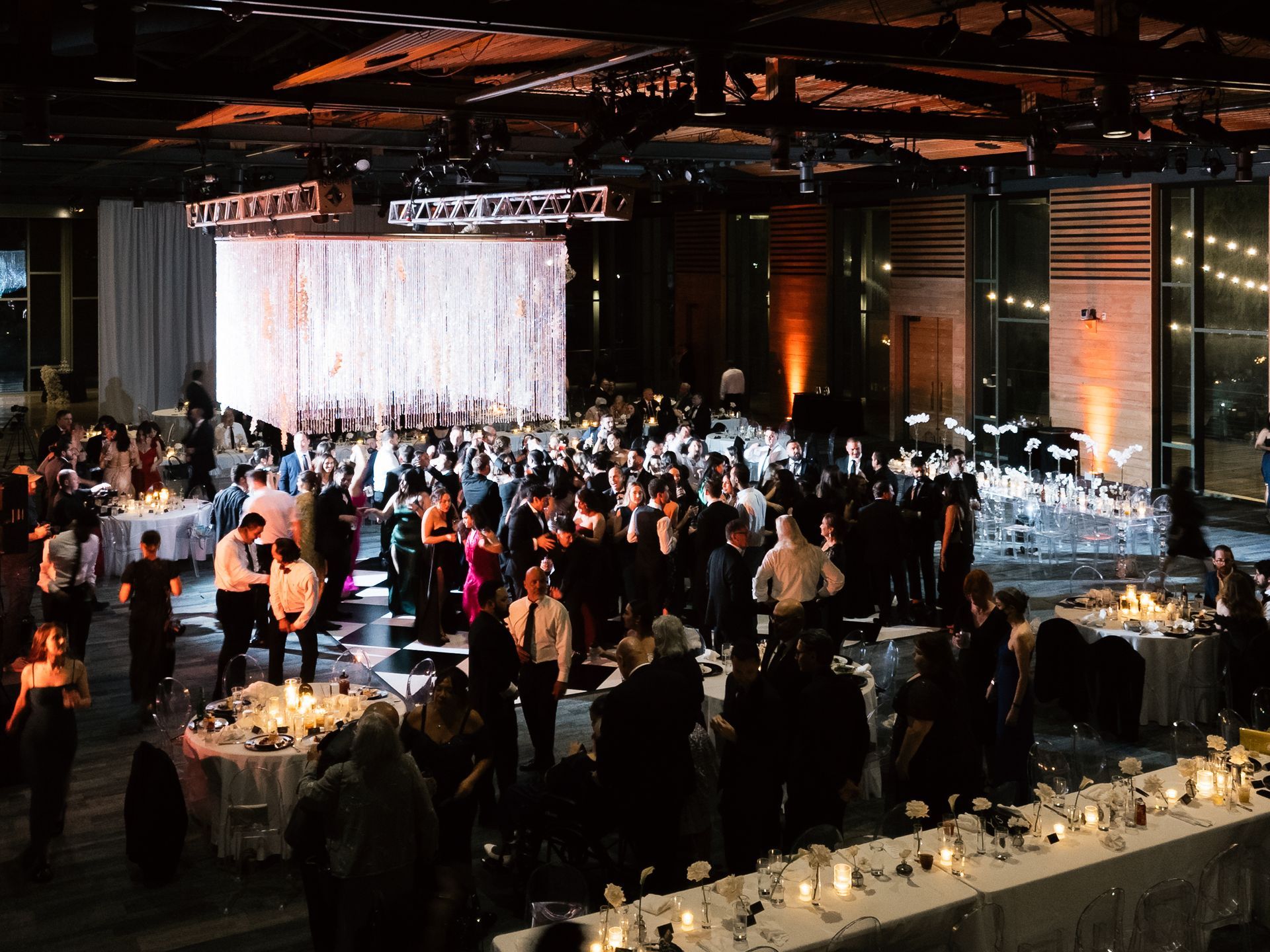 Wedding reception at the Witte Museum Mays Family Center in San Antonio with DJ, dance floor, and Gaines Entertainment providing music and MC services.
