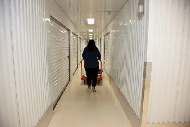 A customer saving valuable items at an air-conditioned self-storage facility in Terre Haute, IN.